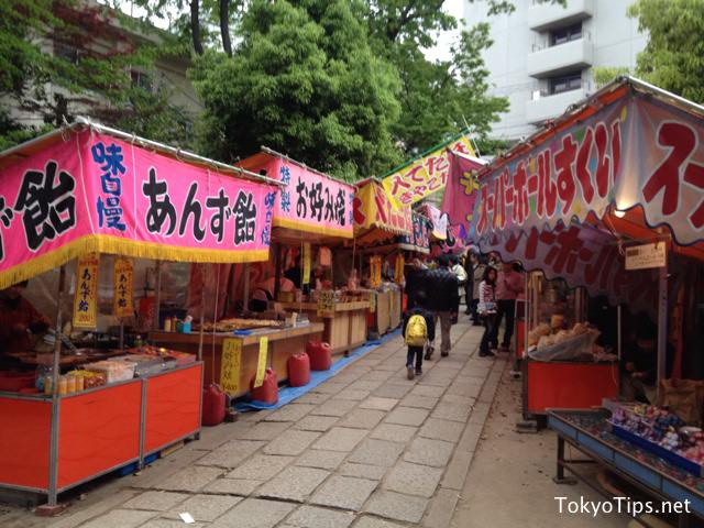 Many stands opened in this shrine. This scene is an old-fashioned style of Japanese festivals at shrines or temples.